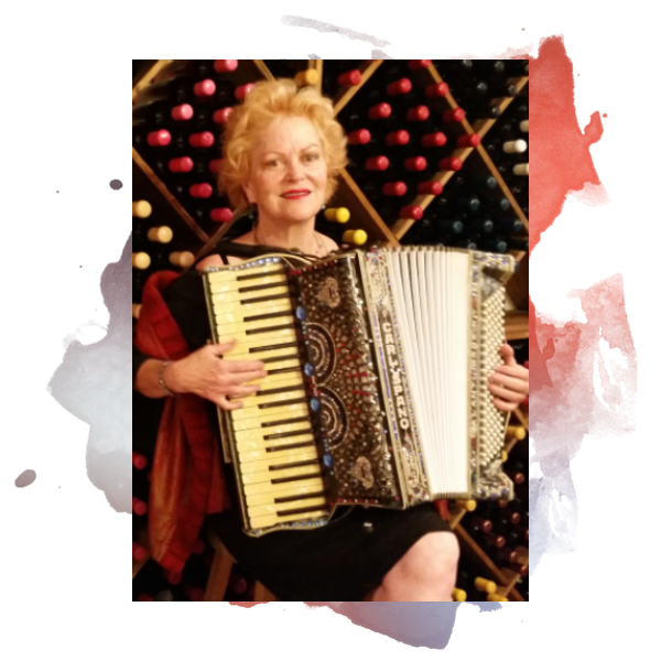 A woman holding an accordion
